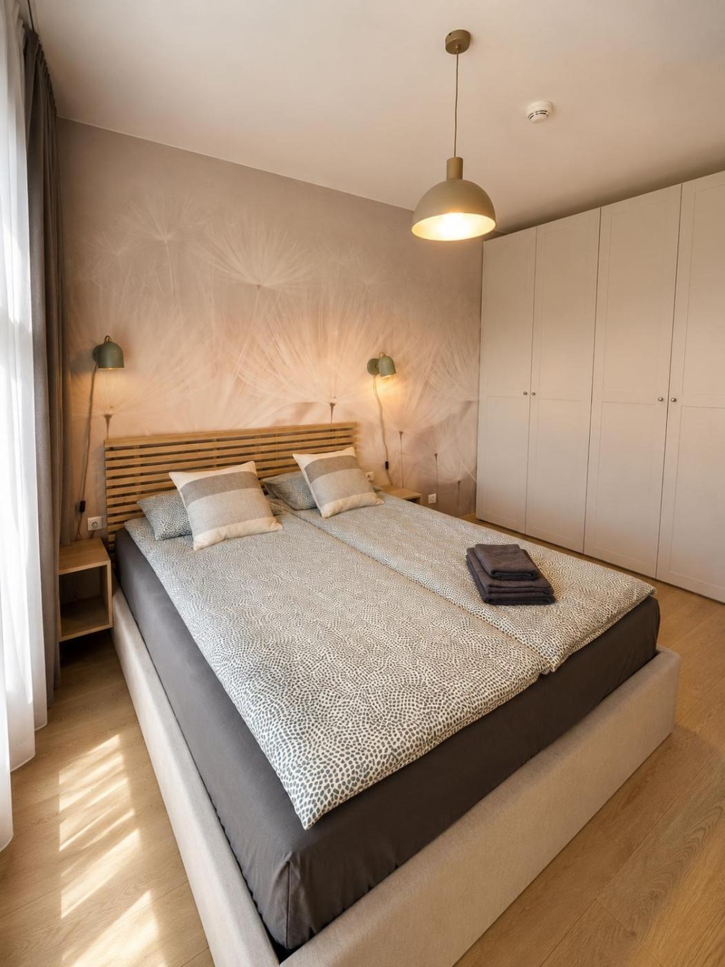 Łóżko w sypialni — Harmony Apartment Portovo