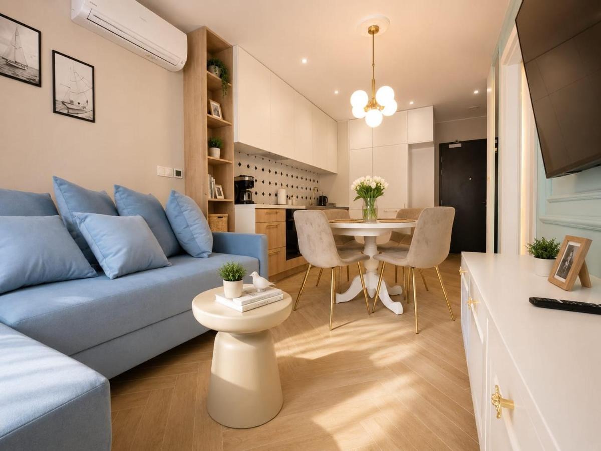 Sea Star Apartment Portovo — salon z aneksem kuchennym